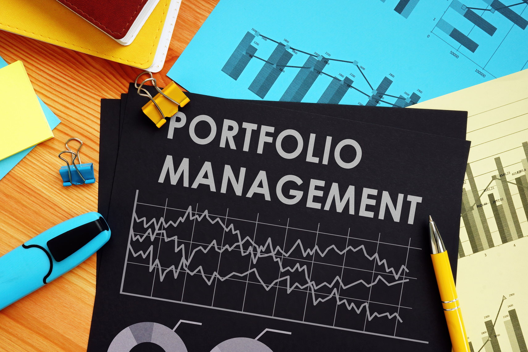 Portfolio management report with data and financial charts.